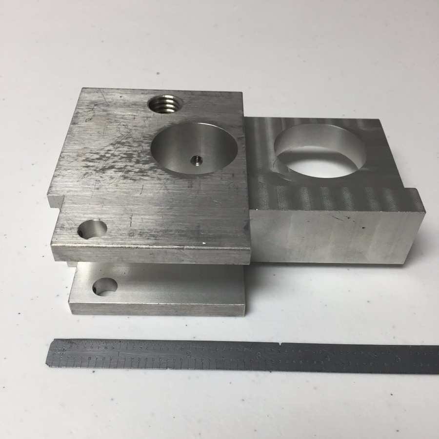Aluminum fixture blocks with bored pockets and tapped holes
