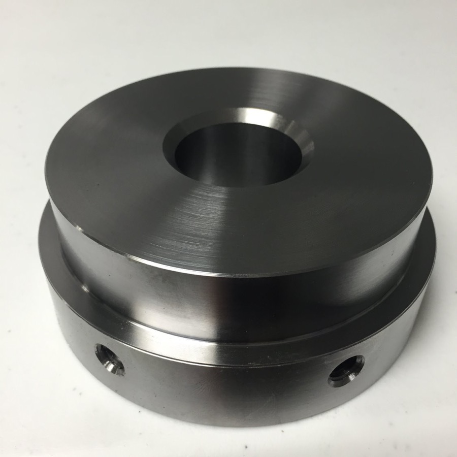 Turned steel hub with bored center and cross-drilled set-screw holes