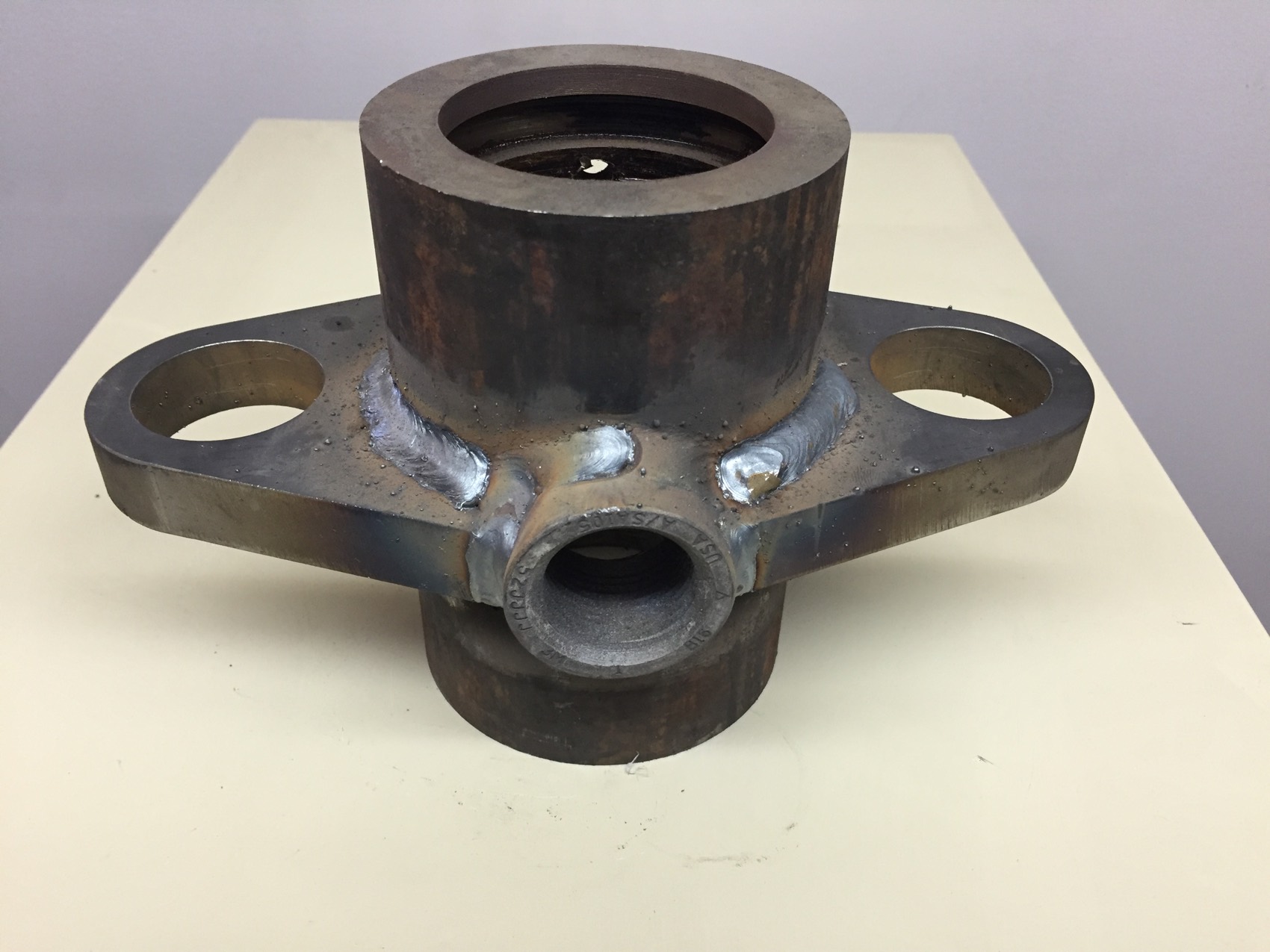 Welded steel flange and hub assembly with threaded side port